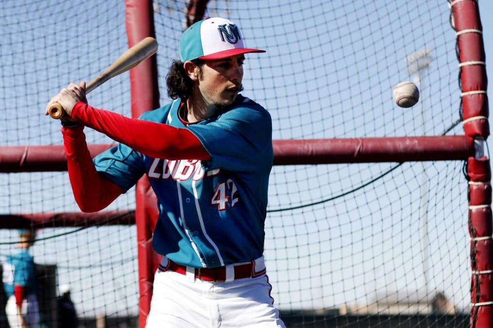 Senior Taylor Duree eyes the baseball just before he bats Friday afternoon during the Lobos media day at Santa Anna Star Field. 