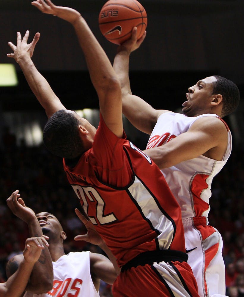 	Dairese Gary soars above UNLV’s Chace Stanback at The Pit on Jan. 9. UNM will face  an improving Colorado State, which is 2-2 in the Mountain West Conference, on Saturday.