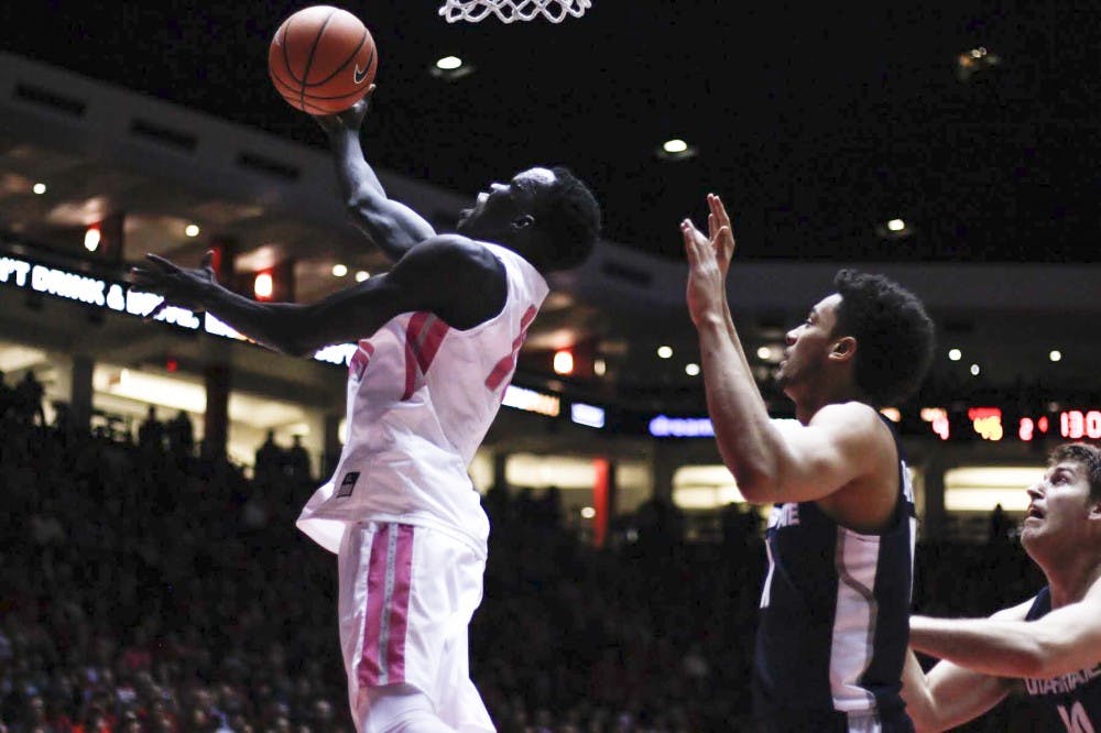Makuach Maluach scores against Utah State on Feb. 14, 2017 at Dreamstyle Arena. Lobos win 78-63 against Utah State. &nbsp;