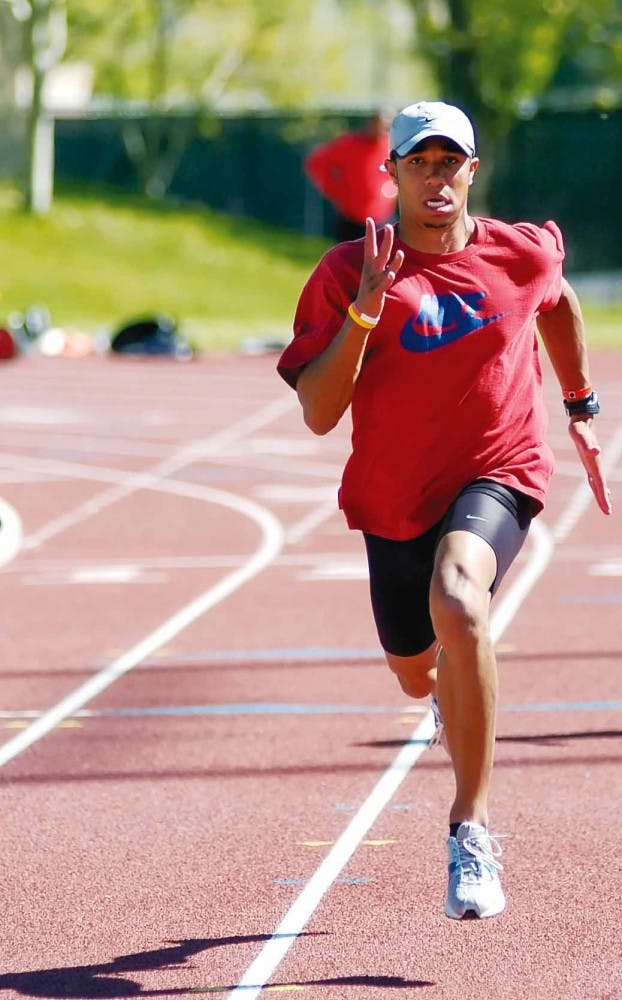 Jarrin Solomon sprints during Thursday's practice at the UNM Track and Field Complex. He and three other members of the UNM team have been named Mountain West Conference Track and Field Athletes of the Week this outdoor season. 