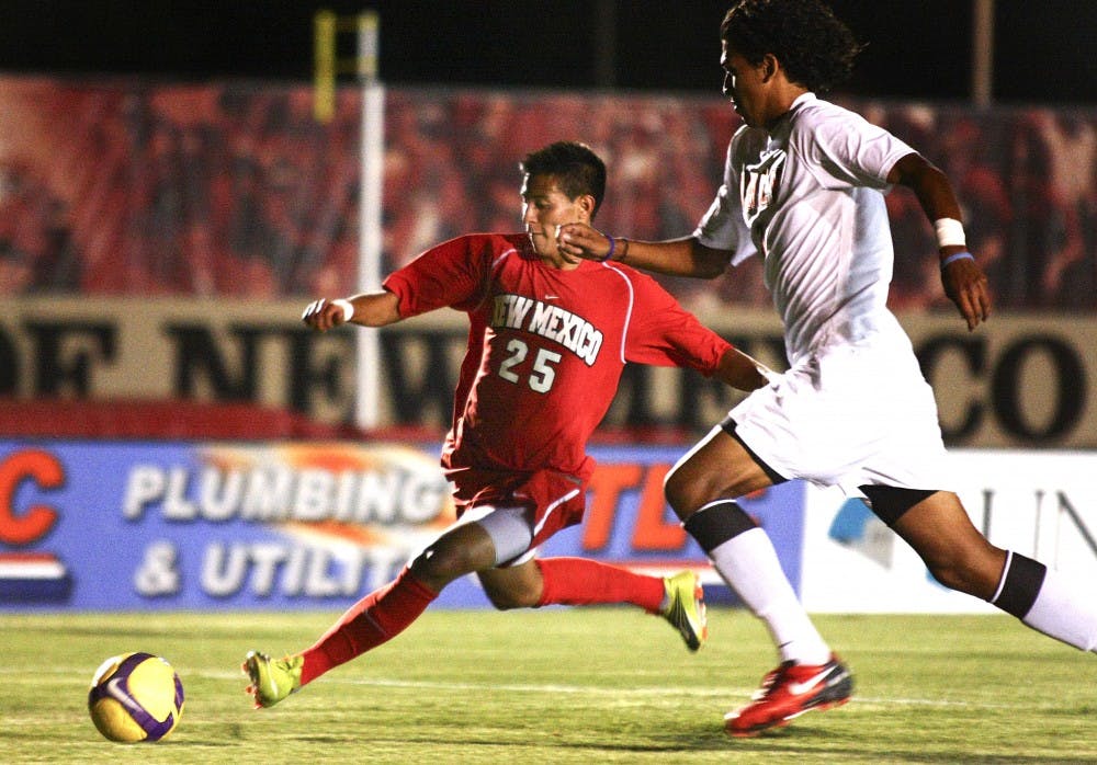 	UNM’s Patrick Pacheco prepares to launch a shot on goal Friday night at the UNM Soccer Complex. Pacheco scored the first goal of the game in UNM’s 2-1 conference opener win against UNLV.