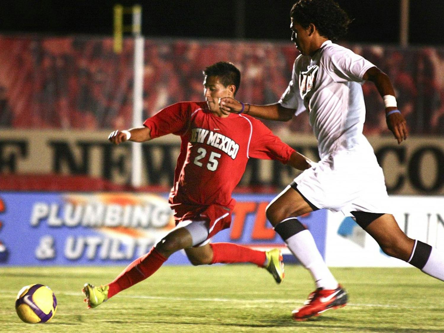 	UNM’s Patrick Pacheco prepares to launch a shot on goal Friday night at the UNM Soccer Complex. Pacheco scored the first goal of the game in UNM’s 2-1 conference opener win against UNLV.