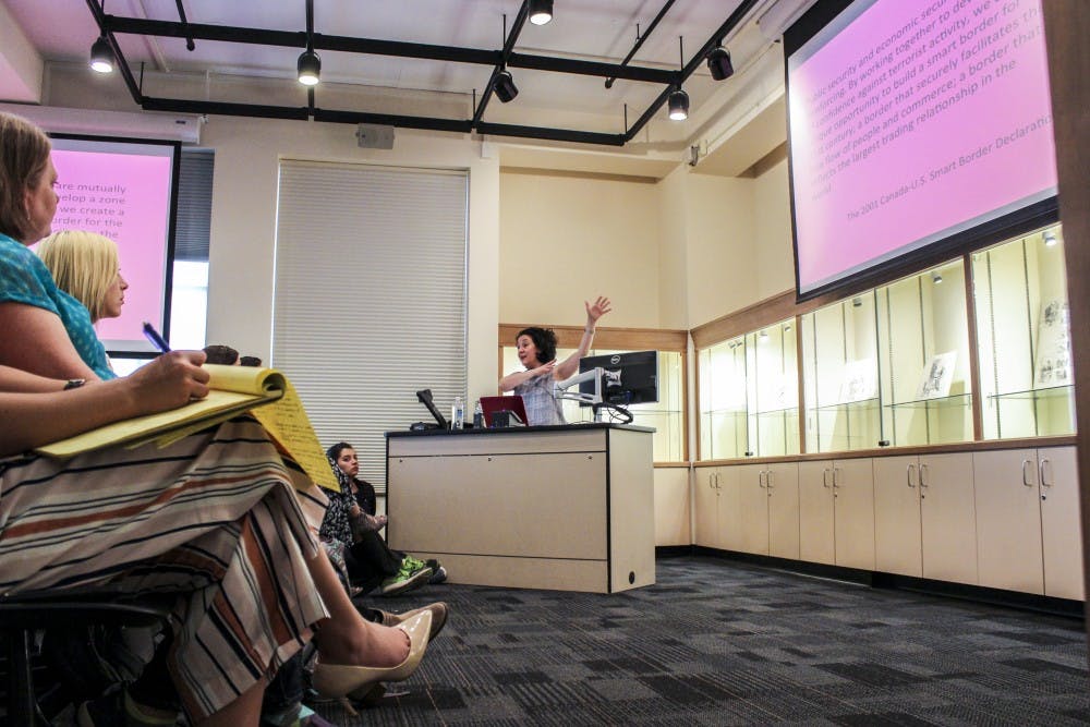 Yale University professor Alicia Schmidt Camacho speaks about militaristic surveillance on the U.S. Mexico boarder Wednesday, March 24, 2017 at the Center of Southwest Research in Zimmerman Library.&nbsp;