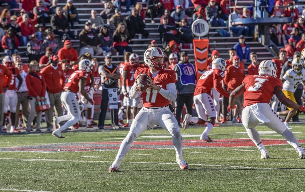 Coltin Gerhart (#11) prepares to pass the ball during the last football game of the year for UNM. UNM football took a crushing blow from Wyoming at Dreamstyle Stadium on Nov. 24, 2018.
