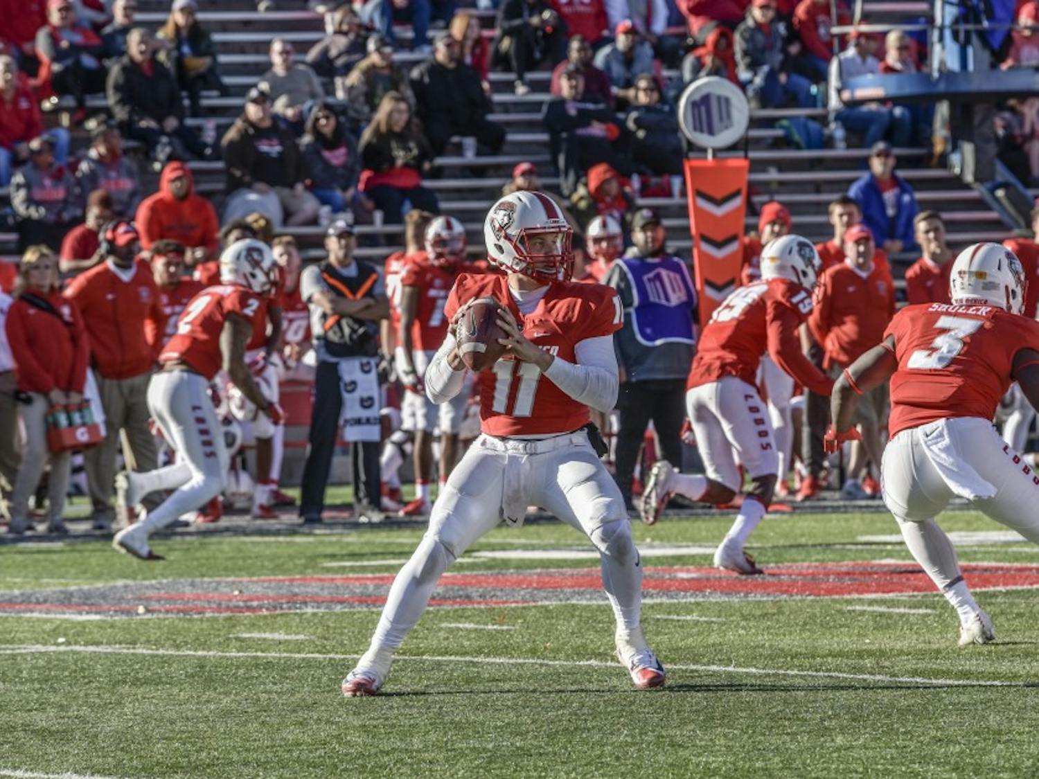 Coltin Gerhart (#11) prepares to pass the ball during the last football game of the year for UNM. UNM football took a crushing blow from Wyoming at Dreamstyle Stadium on Nov. 24, 2018.