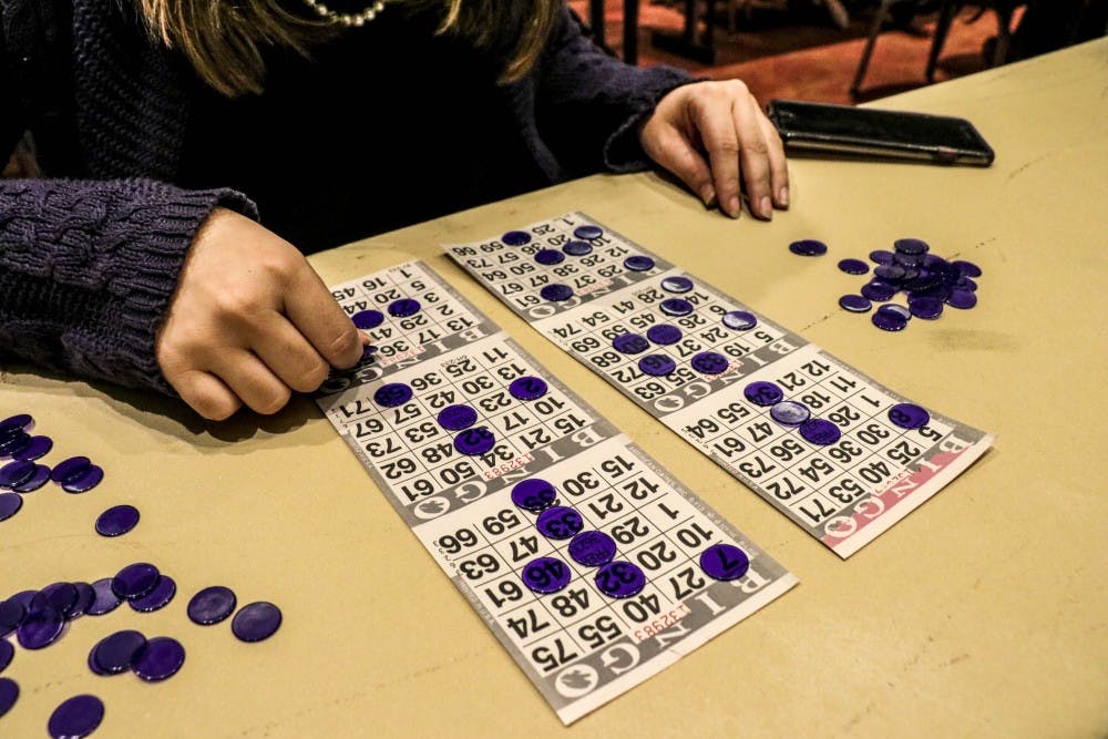 UNM student Sara Gutierrez plays bingo on Nov. 9 during a LoboTHON fundraiser.