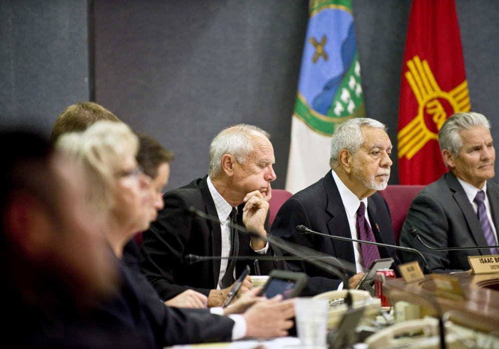 City Councilors Isaac Benton and Rey Garduno listen to public testimonies concerning legislations being proposed on Monday night Sept. 21, 2015. Benton and Garduno are strong proponents of the decriminalization of marijuana and passed a 5-4 vote in favor of it.