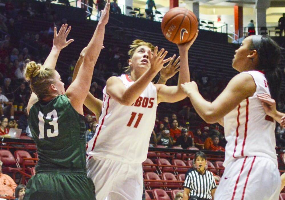 Lobo junior forward Alexa Chavez, 11, attempts to shoot the ball into the hoop during the exhibition game against Eastern New Mexico University at the Pit on Sunday afternoon. The Lobos will play against UTPA in Chicago this afternoon at 2:30 p.m.