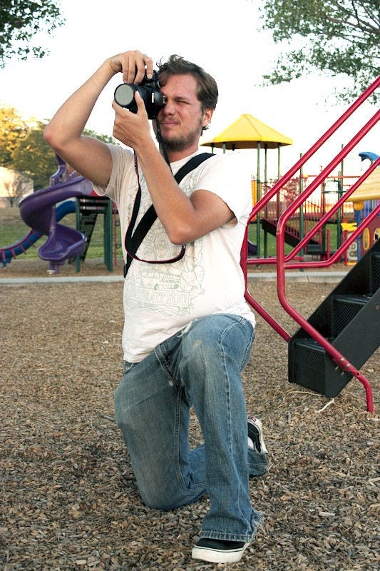 	Photographer Andrew Moore focuses on portraiture photography. Moore incorporates both urban and organic elements.