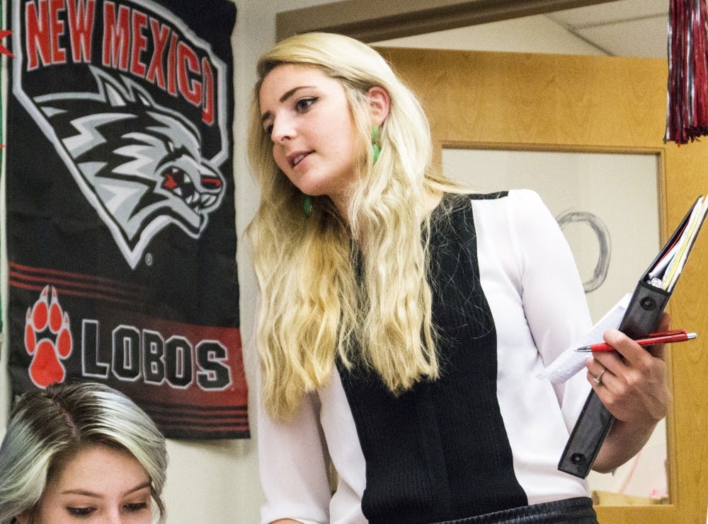 Amelia Linde, executive director for ASUNM Community Experience, works with her team at the SUB Wednesday afternoon. Spring Storm is a community outreach program hosted by ASUNM that sends volunteers into the Albuquerque metro area to assist the community.