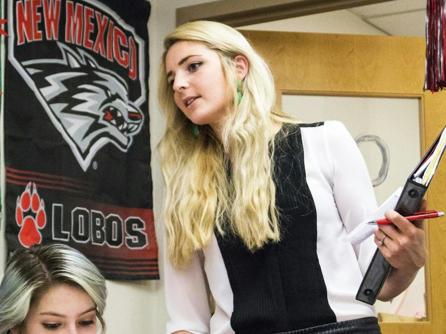 Amelia Linde, executive director for ASUNM Community Experience, works with her team at the SUB Wednesday afternoon. Spring Storm is a community outreach program hosted by ASUNM that sends volunteers into the Albuquerque metro area to assist the community.