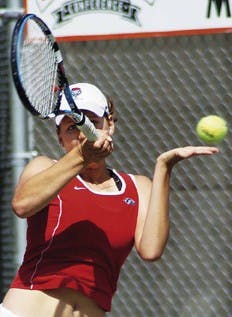 Lobo junior Nora Quinta plays in her singles match against UNLV's Nikol Dimitrova on Saturday at the Lobo Tennis Club. Quintal lost 6-4, 6-3. UNM lost 5-2 against the Runnin' 