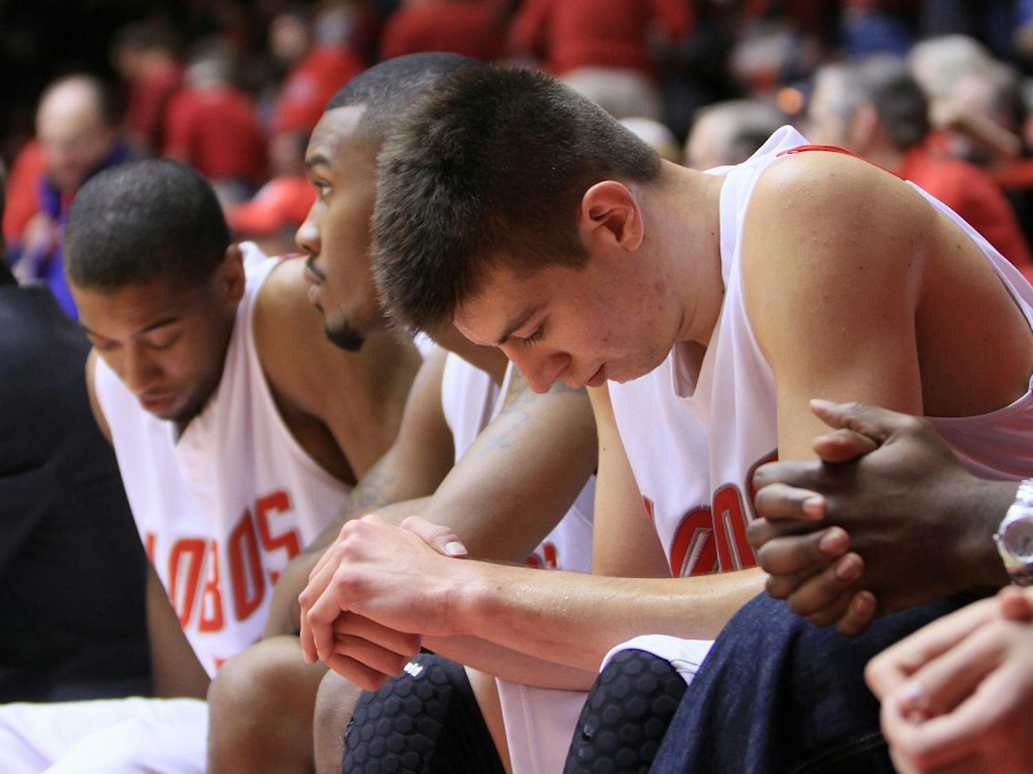 Roman Martinez sits somberly on the bench during the Lobos’ 74-62 loss at The Pit to Mountain West Conference foe UNLV on Jan. 9. The Lobos started the season 14-1 overall, but have since dropped two consecutive games to San Diego State and the Runnin’ Rebels.