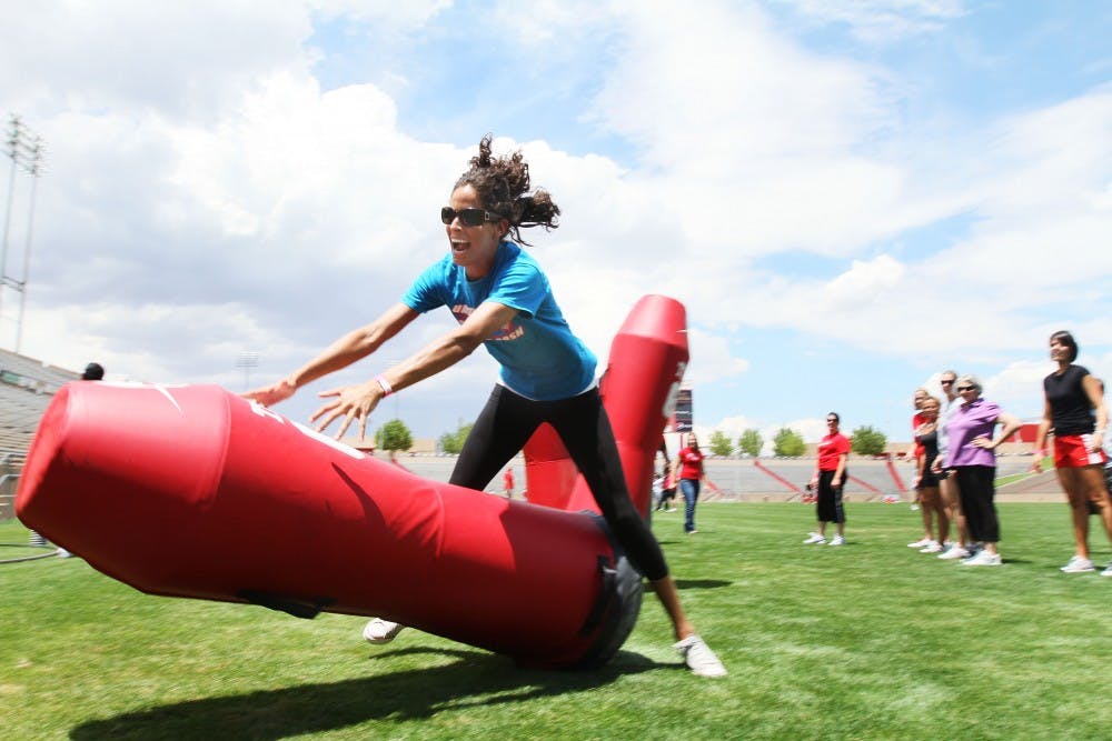 	Robin Miramontes runs through a drill at the women’s clinic on Saturday. The camp was put on by the UNM football program and run by quarterbacks coach David Reaves. 