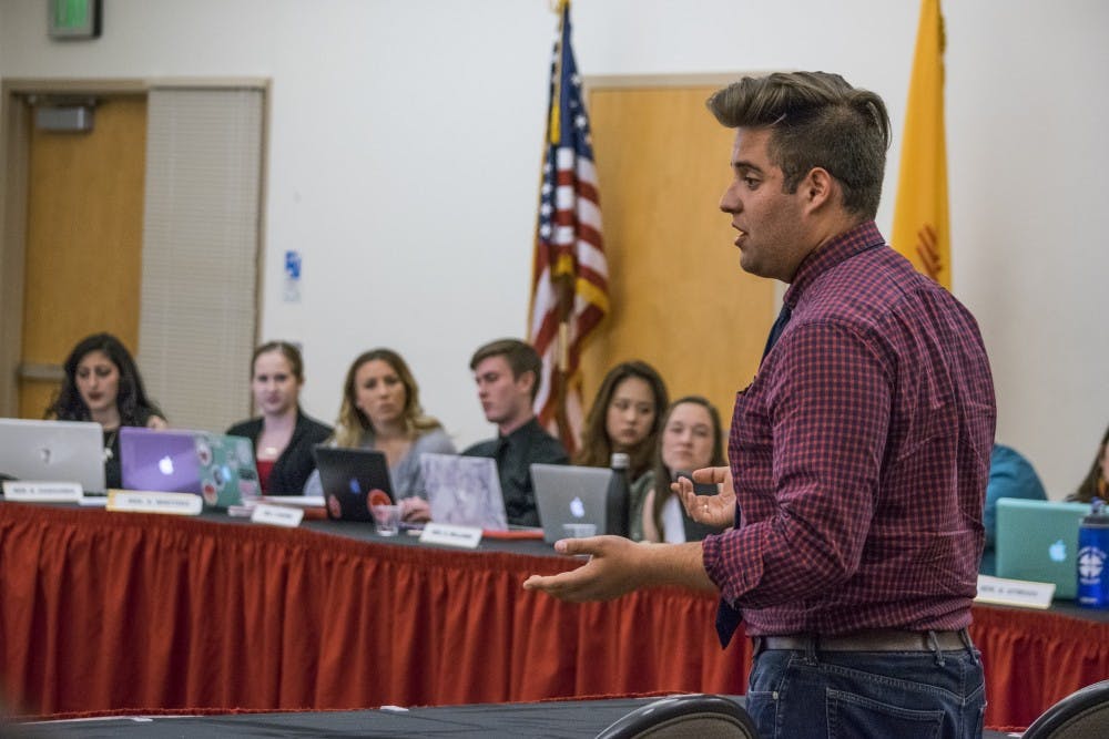 ASUNM President Kyle Biederwolf speaks to ASUNM representatives during an April 27, 2016 meeting at the SUB. Three senators who did not run in the spring ASUNM election will serve as senators in the fall, following a rare procedural undertaking in recent weeks