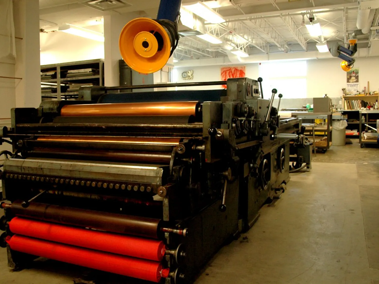 An old German print machine sits idle at the Tamarind Institute located at the corner of Central Avenue and Stanford Drive. The Institute will soon celebrate its 50th anniversary at its state-of-the-art facility.