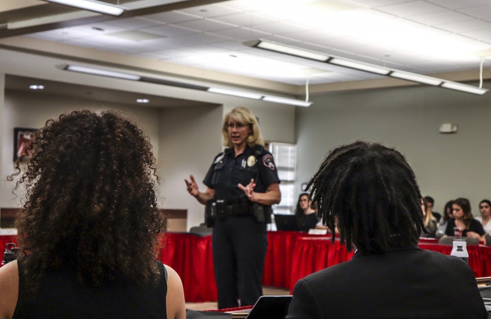 UNMPD Officer Patricia Young speaks to the ASUNM Senate about the Lobo Guardian app on September 12, 2018.
