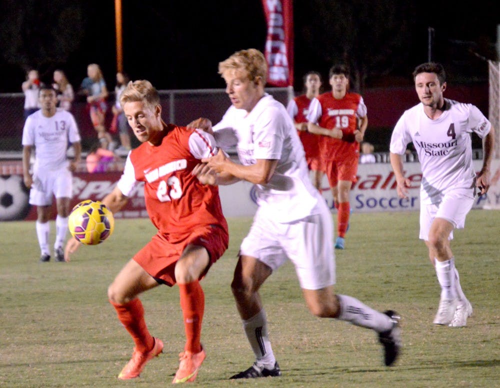 UNM forward Sam Gleadle defends the ball from an MSU player Friday night at the soccer complex. The Lobos beat the Bears 1-0 and play American University this Sunday at 6 p.m..