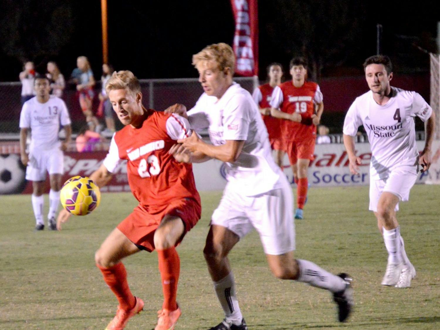 UNM forward Sam Gleadle defends the ball from an MSU player Friday night at the soccer complex. The Lobos beat the Bears 1-0 and play American University this Sunday at 6 p.m..