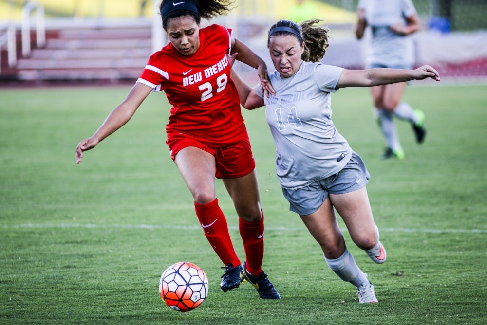 Junior midfielder Claire Lynch, right, attempts to steal the ball from freshman defender Avadney Osbourne Thursday August 11, 2016 at the UNM Soccer Complex. The Lobos played their annual Cherry versus Silver match.