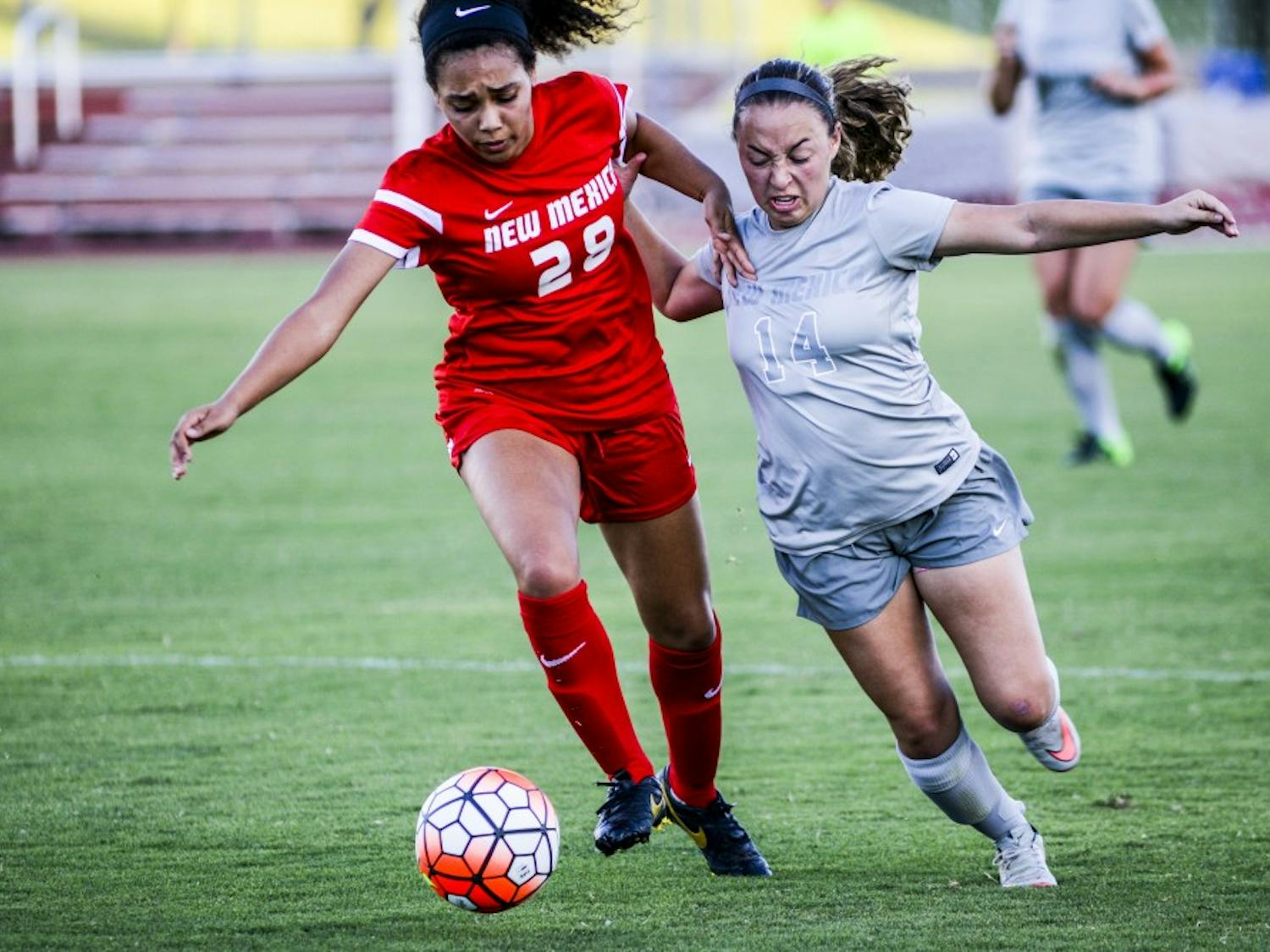 Junior midfielder Claire Lynch, right, attempts to steal the ball from freshman defender Avadney Osbourne Thursday August 11, 2016 at the UNM Soccer Complex. The Lobos played their annual Cherry versus Silver match.