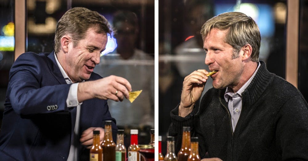 City Councilor Dan Lewis, left, and State Auditor Timothy Keller, right, participate in the Dukes Up Hot Seat interview series for the Albuquerque mayoral run-off election candidates on Oct. 25, 2017. Each interview consisted of the candidates eating nine different salsas/hot sauces, each hotter than the last, while also answering questions about their bid to become the city’s next mayor.
