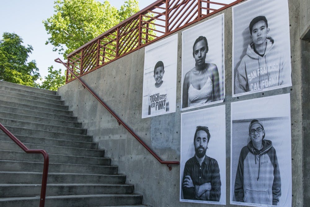 Art exhibit “Inside Out” hangs on the walls by the stairs of the SUB. An addition to this exhibit was previously displayed by the Center of the Universe weeks prior.