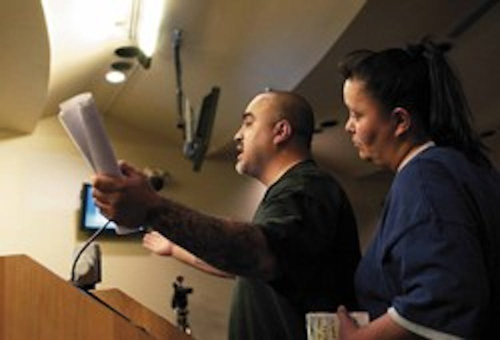 Steve and Maryann Archuleta speak in support of an increased minimum wage at a City Council meeting Thursday night. 