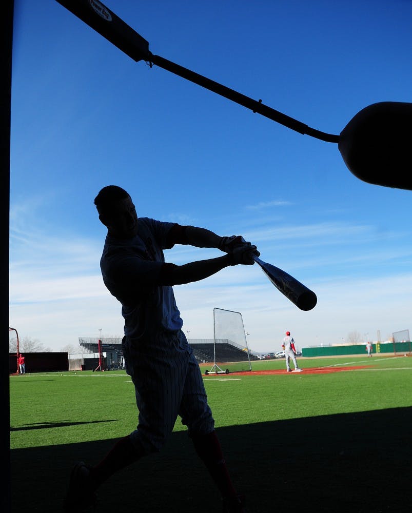 	No. 19 bats in the shadows during Lobo baseball Media Day on Tuesday. Lobo head coach Ray Birmingham scheduled tough opponents this season, in spite of having a young team.