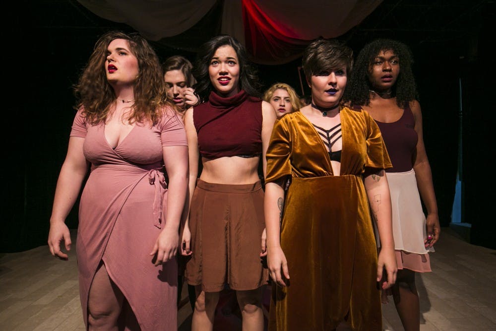 Performers stand on stage during "Our Glass Animals" on Friday, Feb. 17, 2017 at The Cell Theater. The show focuses on issues centered around womanhood in America.