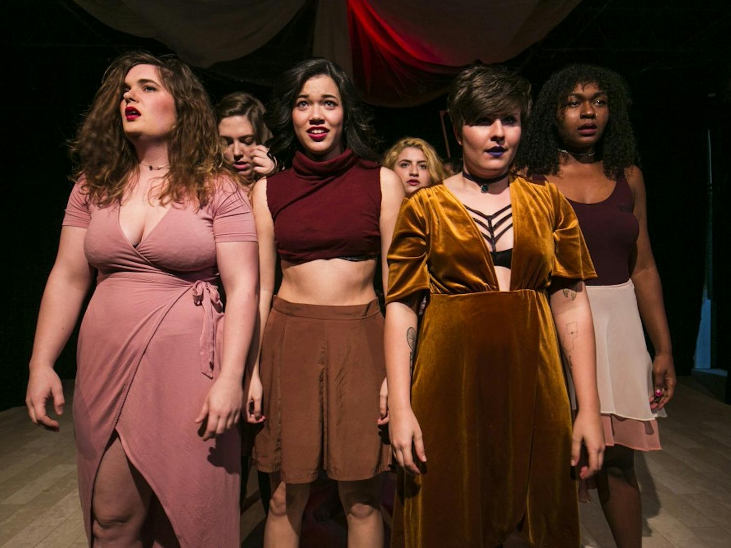 Performers stand on stage during "Our Glass Animals" on Friday, Feb. 17, 2017 at The Cell Theater. The show focuses on issues centered around womanhood in America.