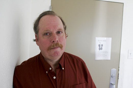 Frank Martin, a disabled student veteran, stands outside of his apartment on July 17. Martin's prescribed Segway was stolen from the  apartment July 3.