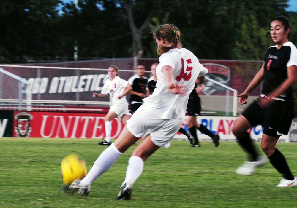 	Elizabeth Lambert blasts the ball downfield during UNM’s 2-0 win over Idaho State. The Lobos kick off a four-game road trip today.