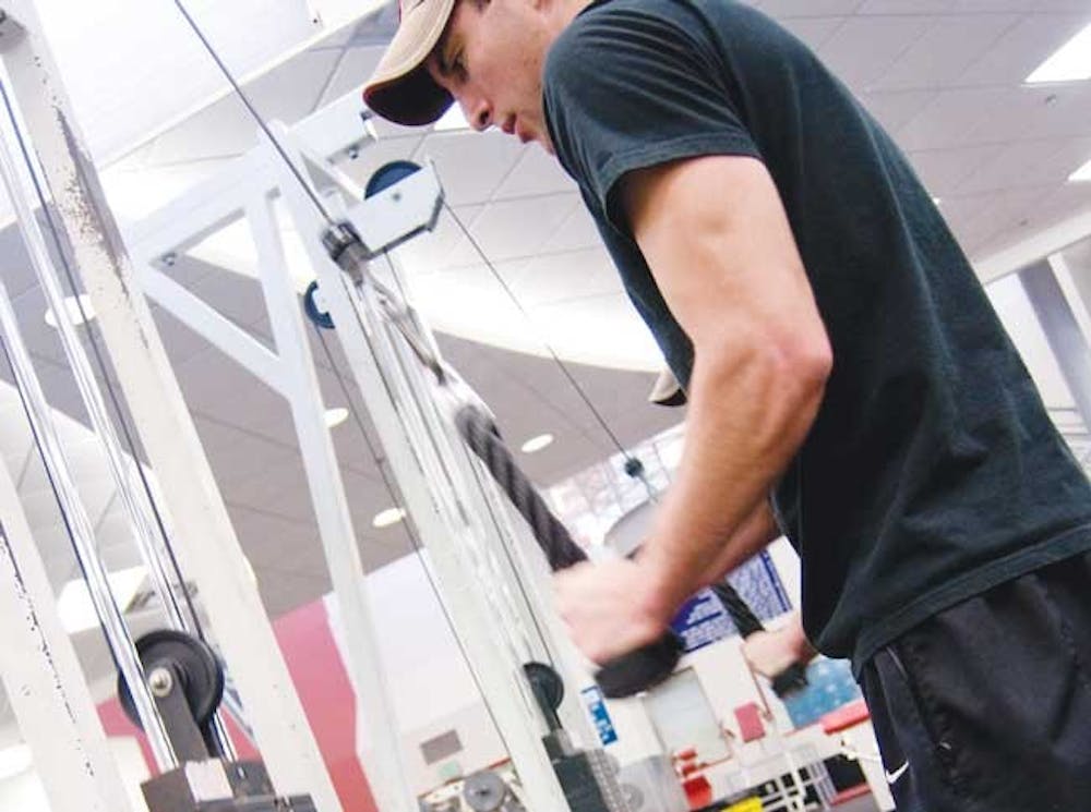 Gabe Mondragon works out in Johnson Center on Thursday. UNM took the first step toward building a new student recreation center by spending $80,000 on planning. 