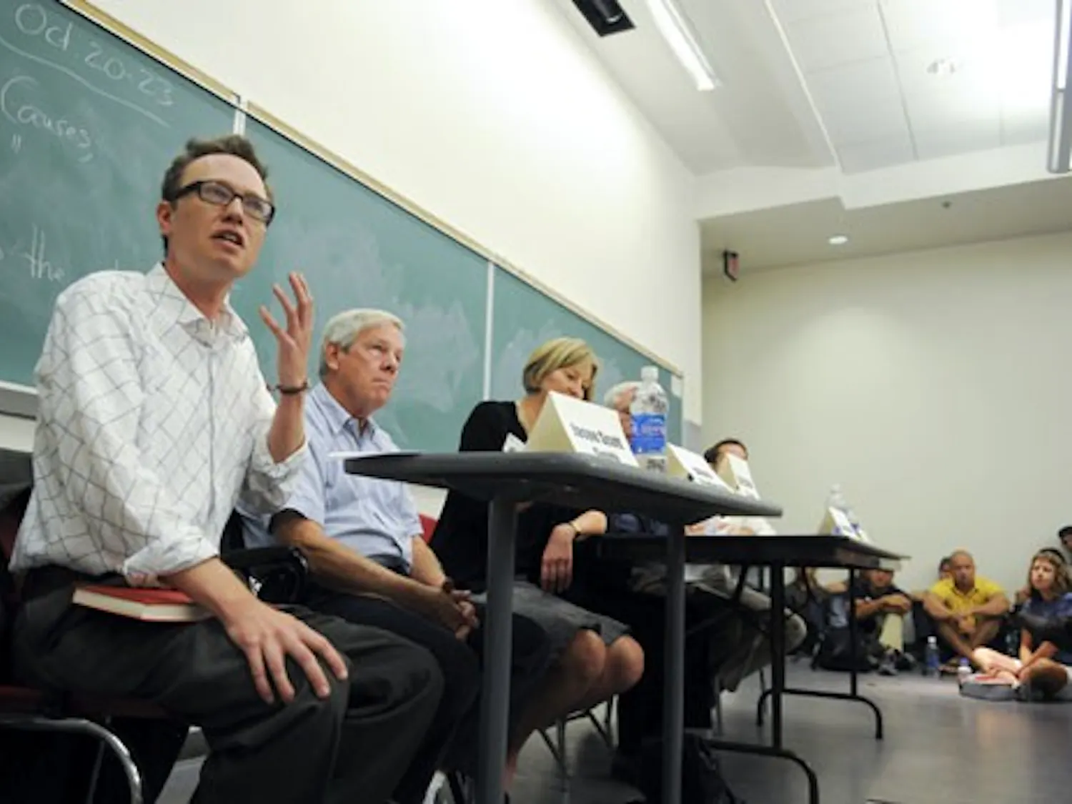 Jason Scott Smith speaks during a roundtable discussion on the economic crisis held in Dane Smith Hall on Friday.