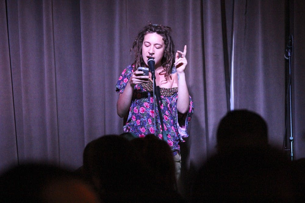 UNM student Avery Frank performs her original poem Light Skin at Tuesday night?s open mic event at Tractor Brewing Company. Tractor Brewing Company hosts Beer and Poetry every second Saturday of the month.