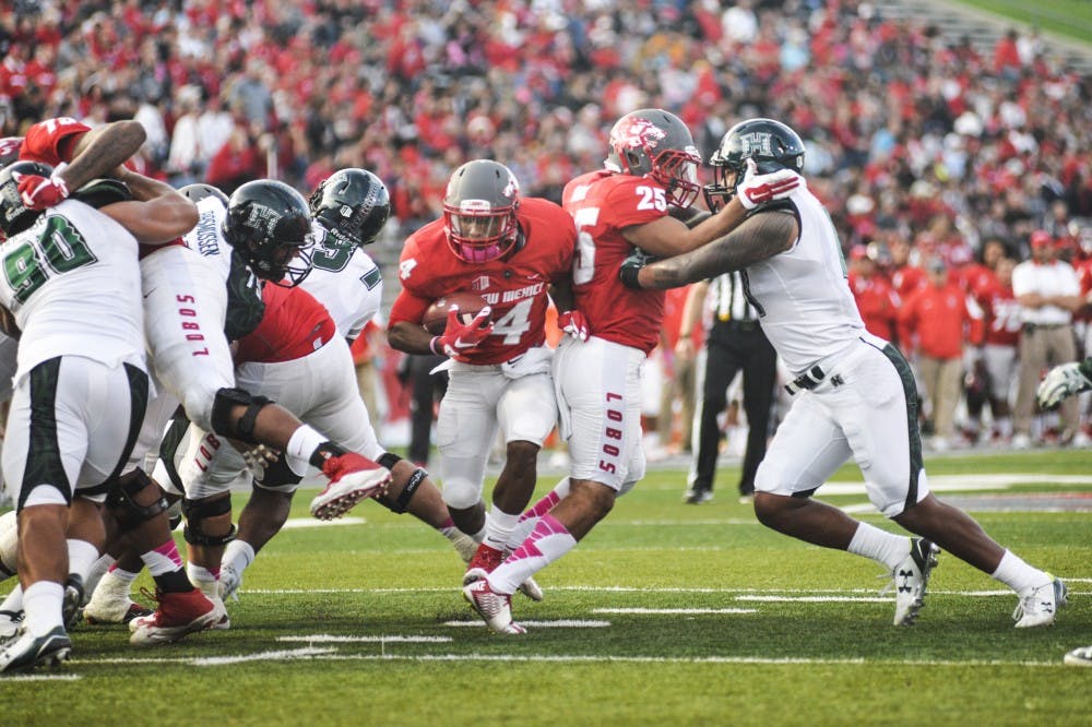 Redshirt junior running back Romell Jordan finds a gap in Hawai'i University's defensive line on Oct. 17, 2015 at University Stadium.