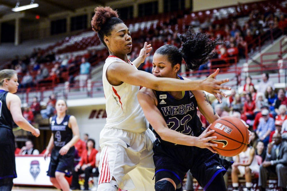 Senior forward Khadijah Shumpert guards a Webber State player Wednesday March 16, 2016 at Johnson Gym.