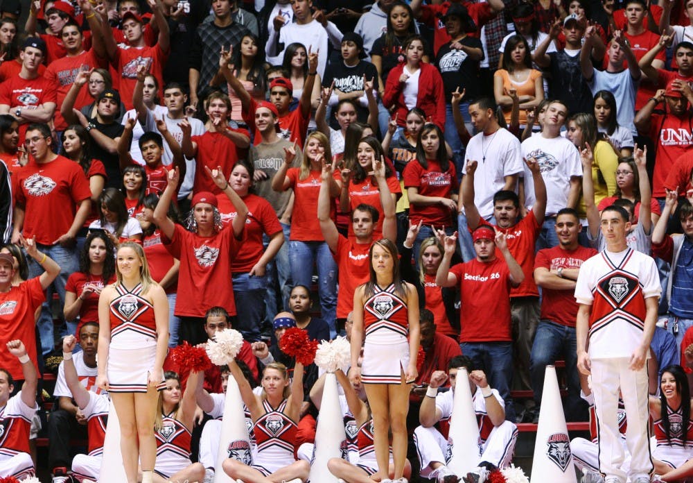 	Students rooted on the men’s basketball team from section 26, the student section, during the exhibition game against New Mexico Highlands University at The Pit Tuesday. Due to the renovations of The Pit, there will be less seats available for fans. 