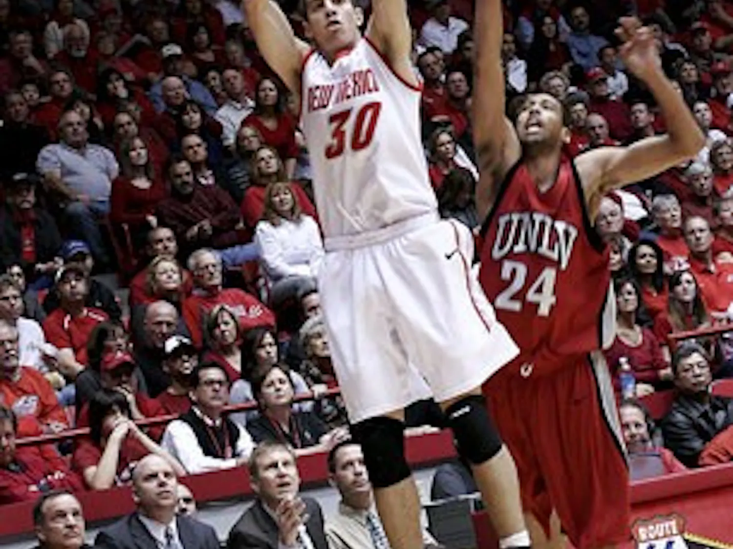 Roman Martinez, seen here launching a 3, said the Lobos have a tough task ahead of them against BYU. The Lobos will travel to Provo, Utah, where UNM has lost eight straight games.