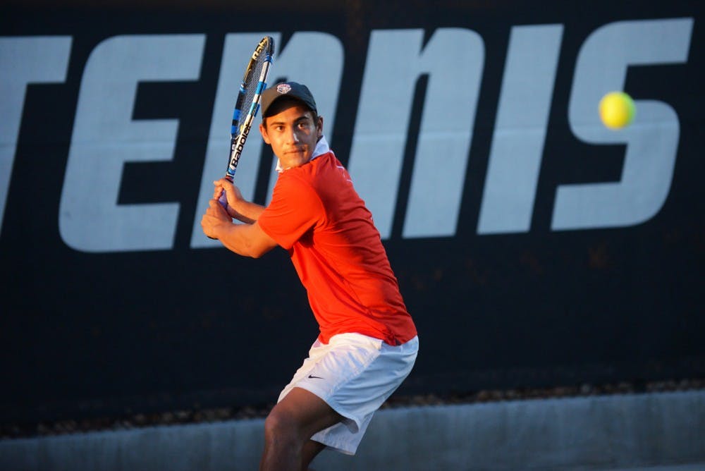 Jorge Escutia gets set to return a volley against Utah last Friday evening. The Lobos will be at home again this weekend to face BYU and Air Force.&nbsp;