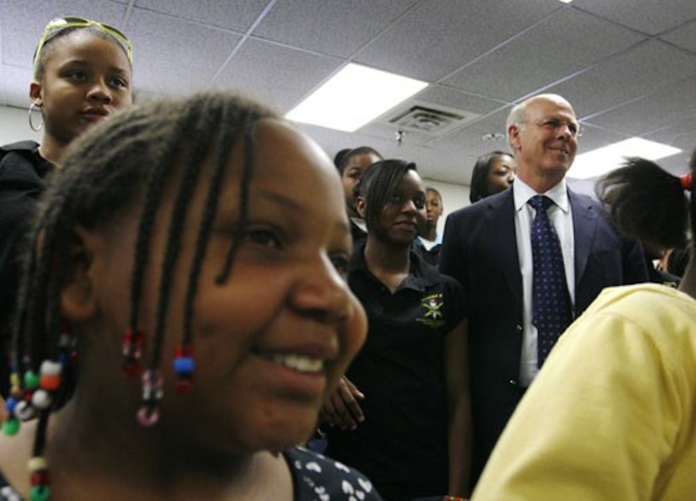 Rep. Steve Pearce meets with high school students in the National Society of Black Engineers pre-college program at the Mechanical Engineering Building on Saturday. Pearce talked about the incomes of college graduates, the work it takes to get a degree an