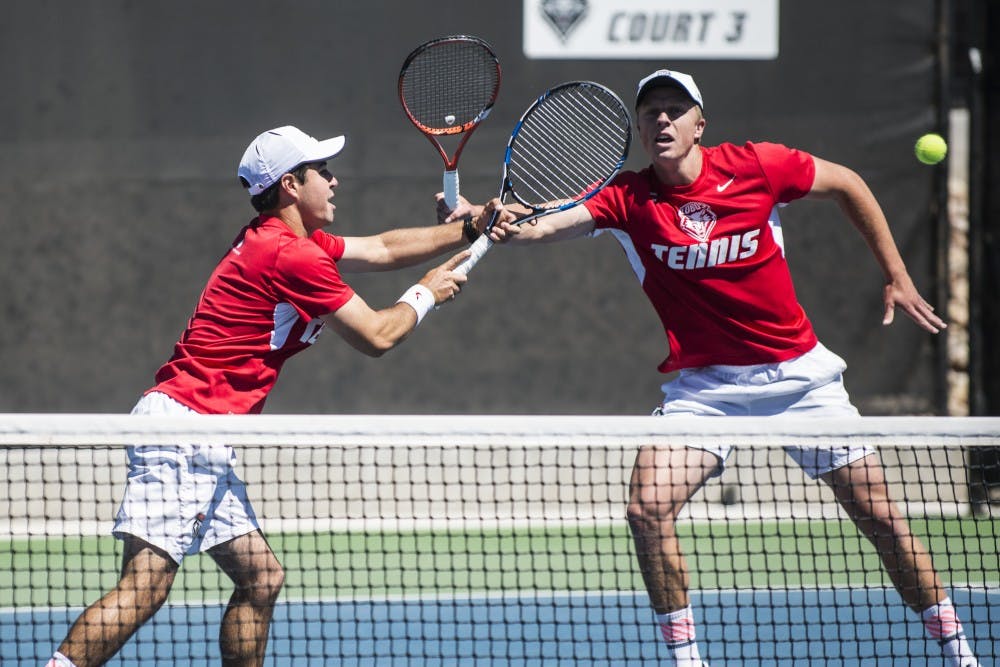 Redshirt junior Rodolfo Jauregui (left) and junior Hayden Sabatka play against Boise State in a doubles match on Sunday at the McKinnon Family Tennis Stadium. The men's tennis team will play San Diego this Friday while the the women’s team plays Boise State.
