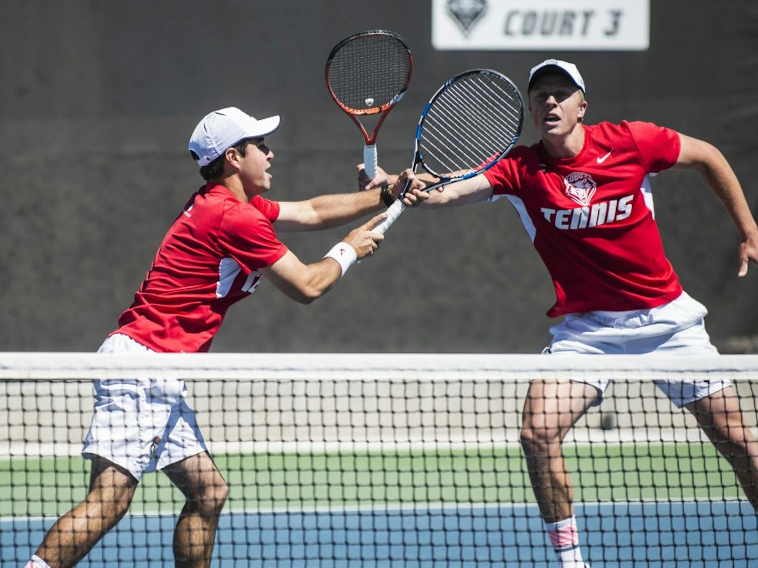 Redshirt junior Rodolfo Jauregui (left) and junior Hayden Sabatka play against Boise State in a doubles match on Sunday at the McKinnon Family Tennis Stadium. The men's tennis team will play San Diego this Friday while the the women’s team plays Boise State.