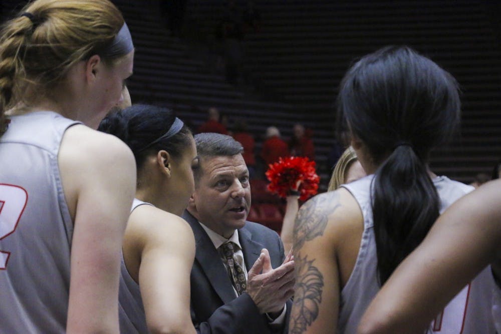 Head coach Mike Bradbury speaks with his team during their game against Boise State Wednesday, Jan. 18, 2017 at WisePies Arena. The Lobos lost while on the road to Wyoming University 68-52.