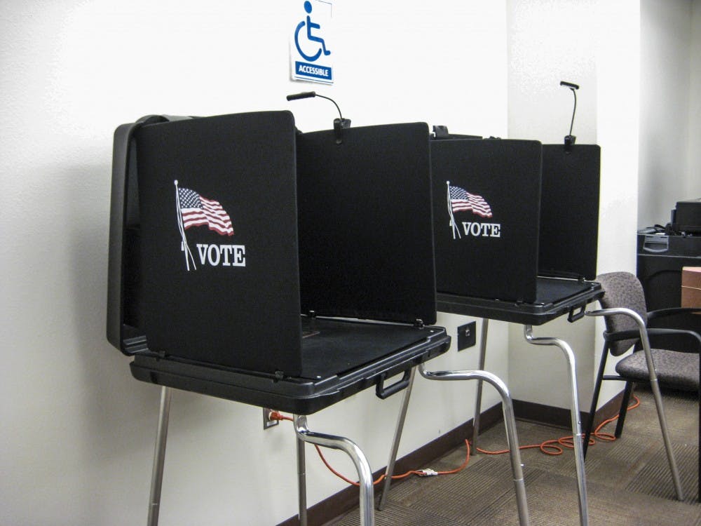 Voting stands remain empty as voting locations are set up.