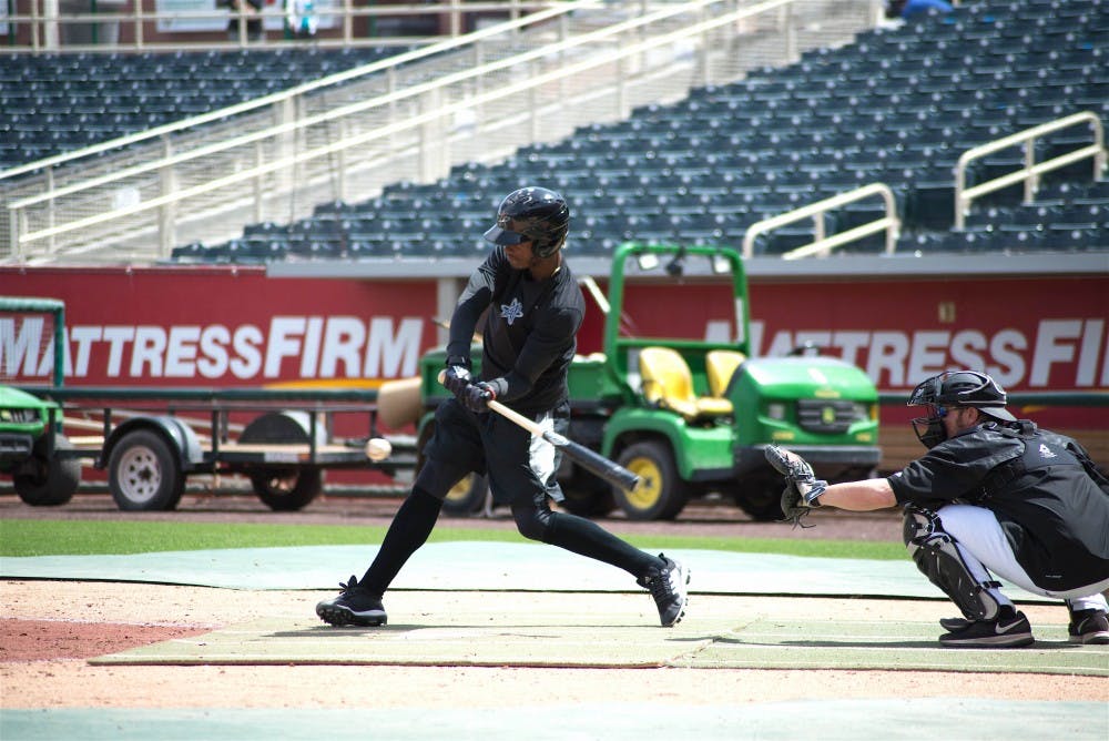 Raimel Tapia swings at a pitch during an Isotopes simulated game on Monday, April 2 at Isotopes Park. The Isotopes home opener is Tuesday, April 10.
