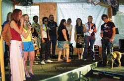 Chachi Redondo, left, owner of Now and Then thrift store, MCs a fashion and dog show at Harlow's on the Hill to benefit the People's Anti-Cruelty Association and the Albuquerque Alliance for the Animals on Sunday.