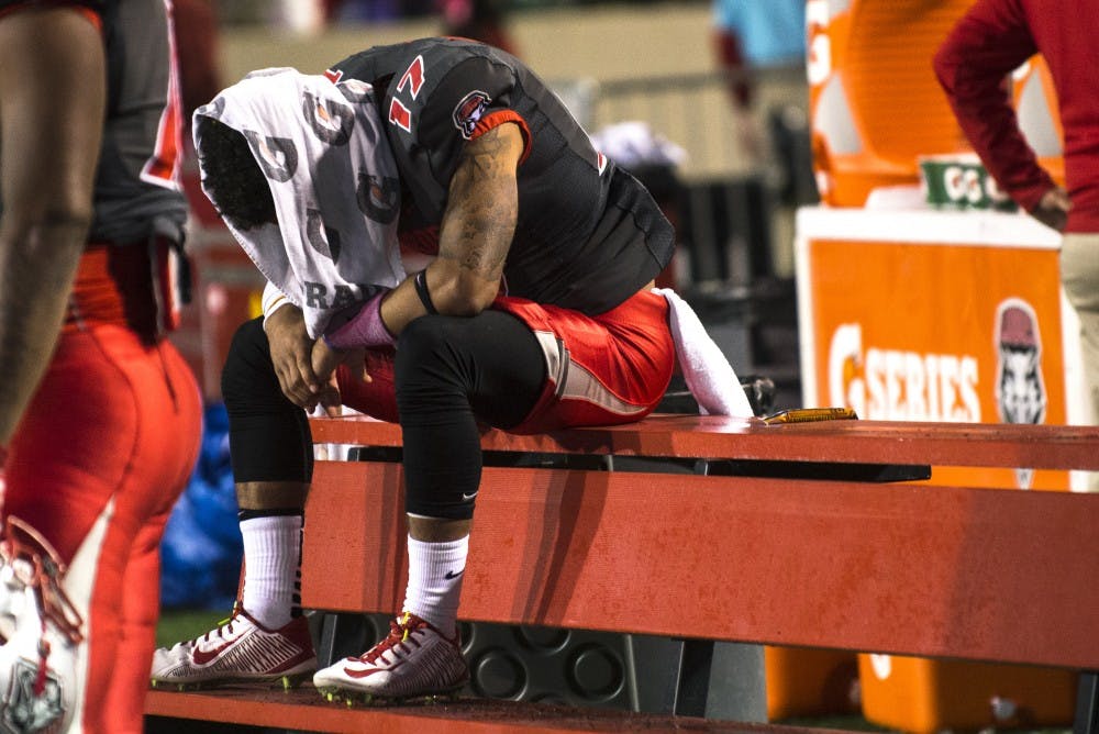 New Mexico defensive back Jadon Boatright hangs his head after the game against San Diego State at University Stadium on Friday. The Lobos fell 24-14 to the Aztecs.