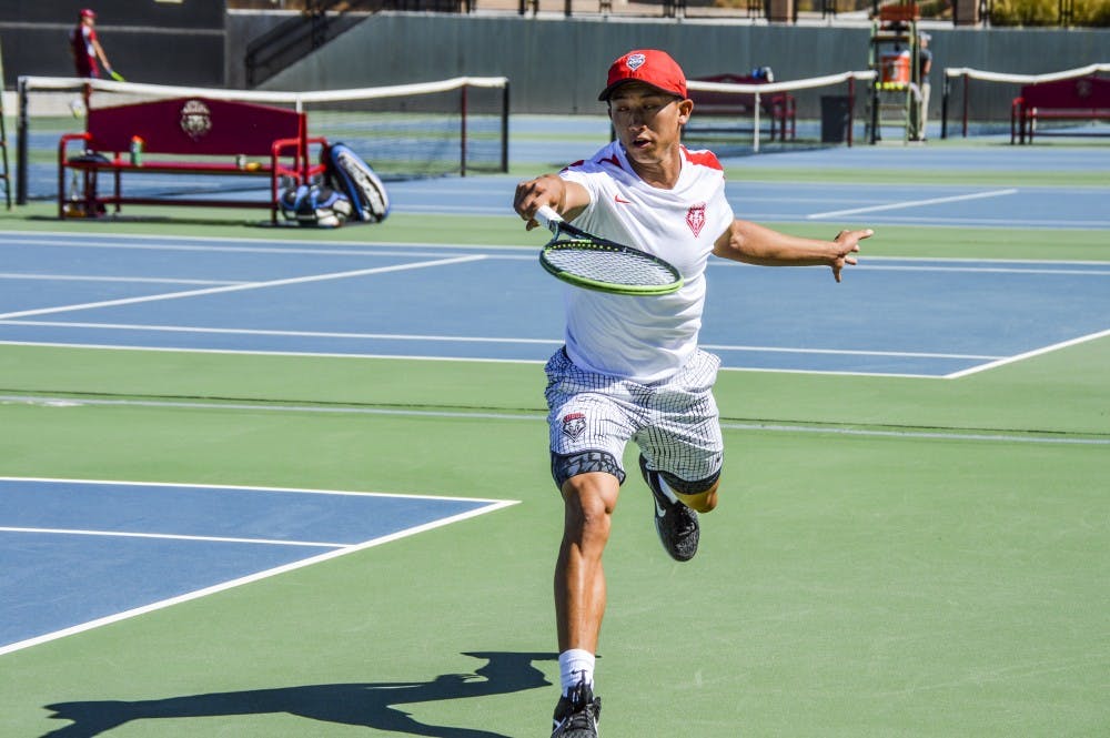 Redshirt sophomore Michael Tran lunges for the ball during the Balloon Fiesta Invitational on Sunday, Oct. 9, 2016 at the McKinnon Family Tennis Stadium. The Lobos men's tennis team will be on the road, with the women's team playing in Albuquerque this week.